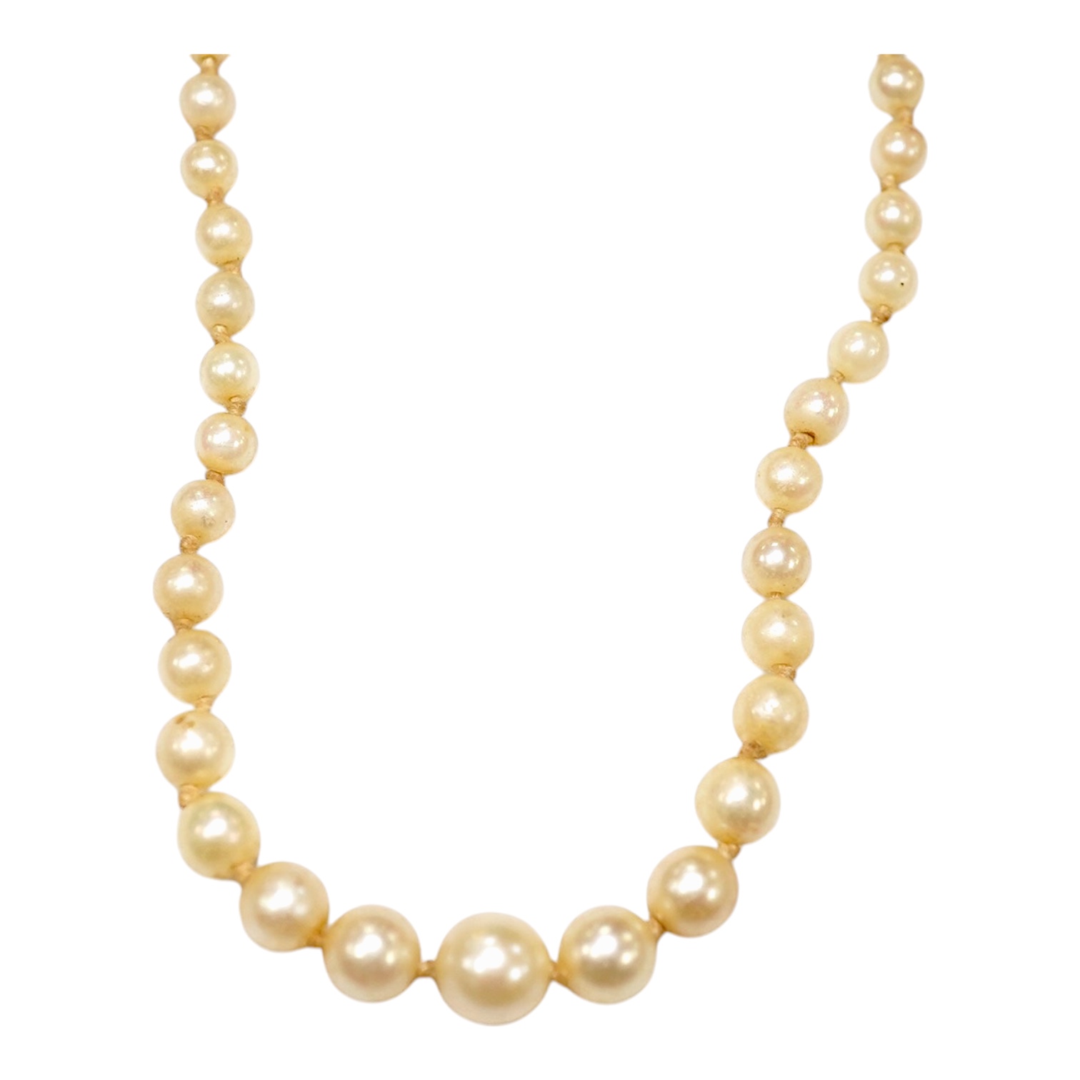 A single strand graduated cultured pearl necklace, with gem set 9ct clasp, 48cm. Condition - fair